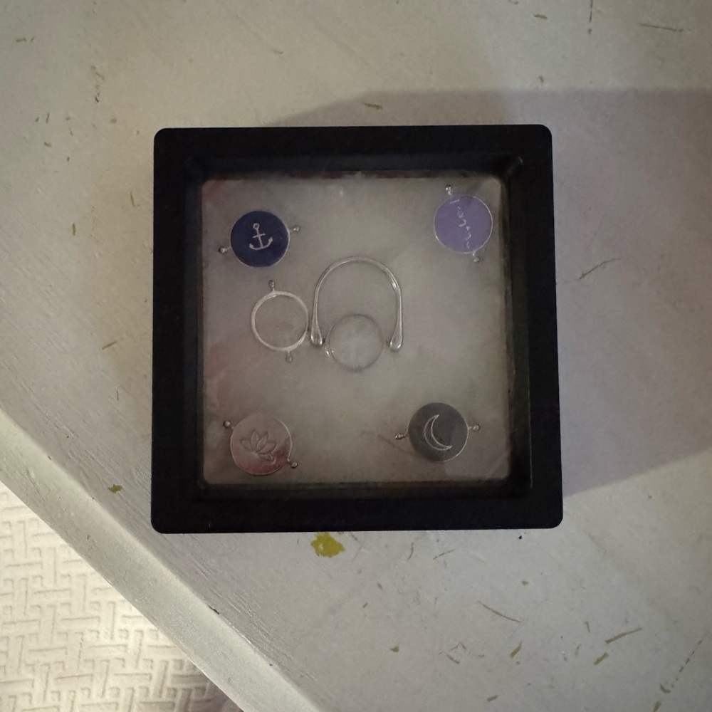 my conquering fidget ring with tops to switch out